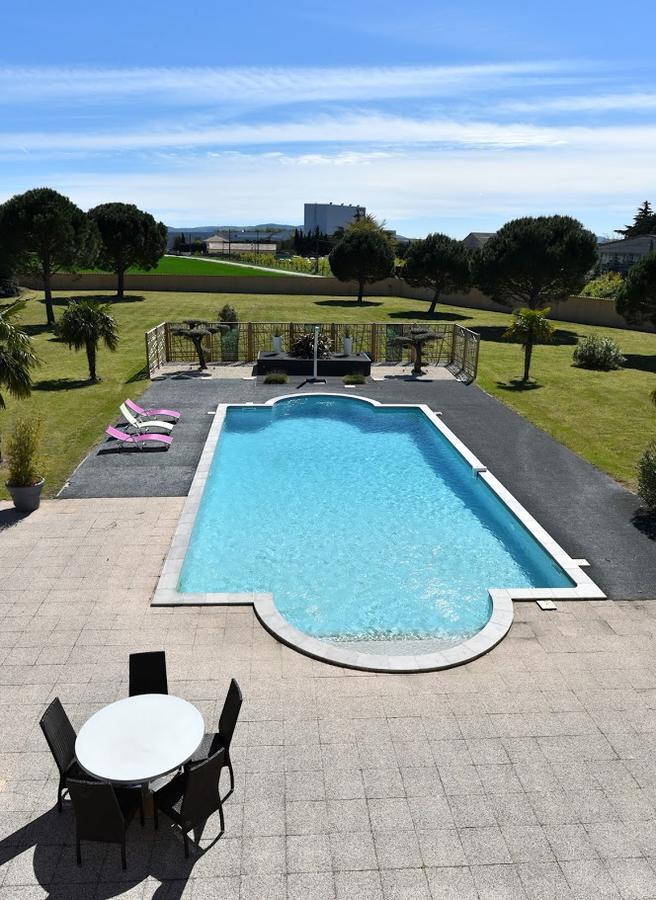 Sous Les Pins Hotel Étoile-sur-Rhône Bagian luar foto